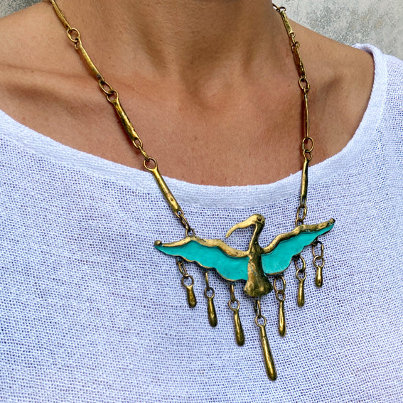 Pelican brass necklace