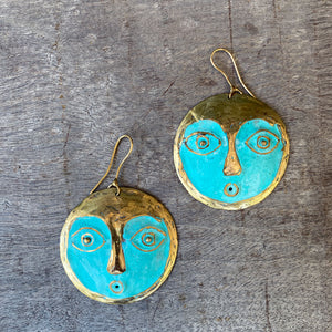 Face brass earrings