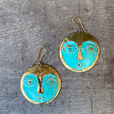 Face brass earrings