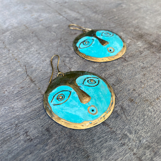 Face brass earrings