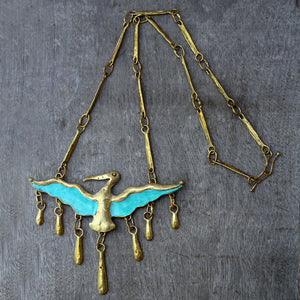Pelican brass necklace
